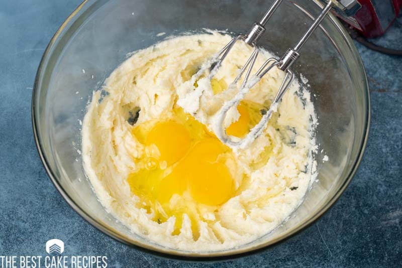 eggs mixing into creamed butter