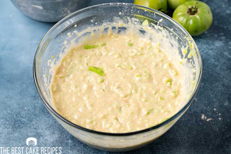 green tomato cake batter in a bowl