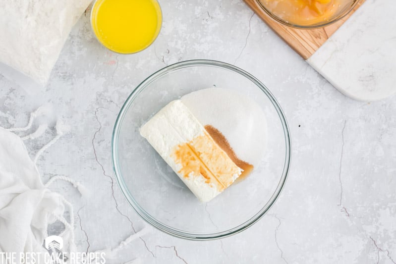 cream cheese, vanilla and sugar in a mixing bowl