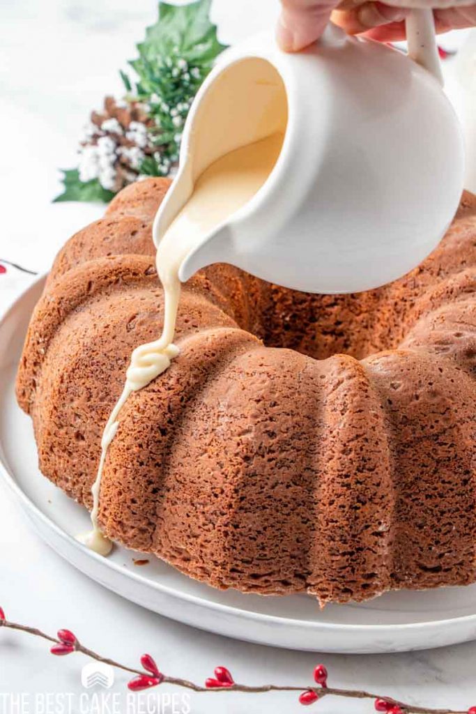 frosting pouring over a bundt cake