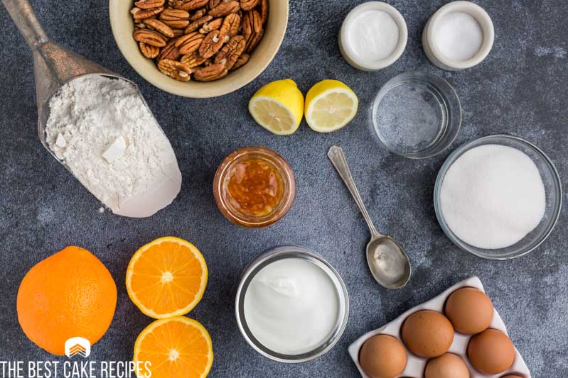 ingredients for orange marmalade cake on a table