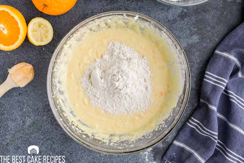 flour in orange cake batter