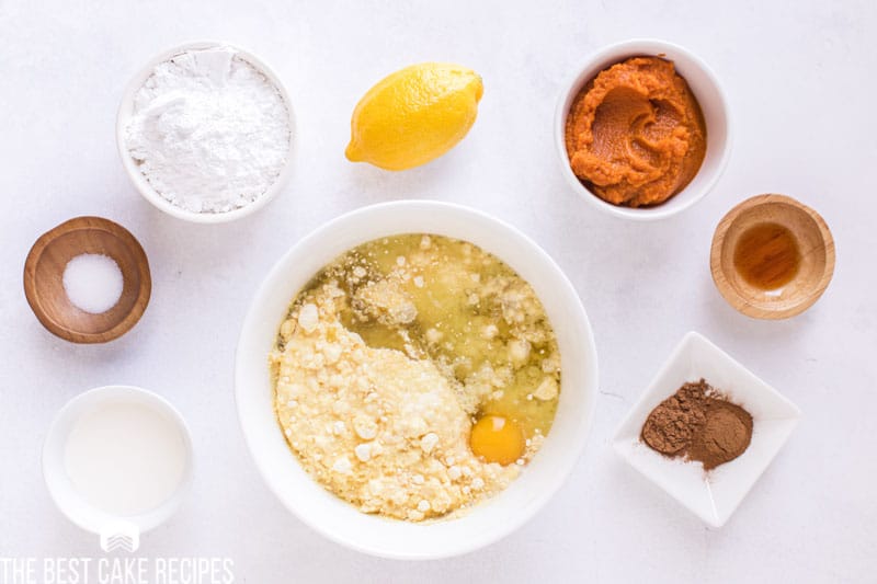 ingredients for pumpkin cake mix donuts on a table