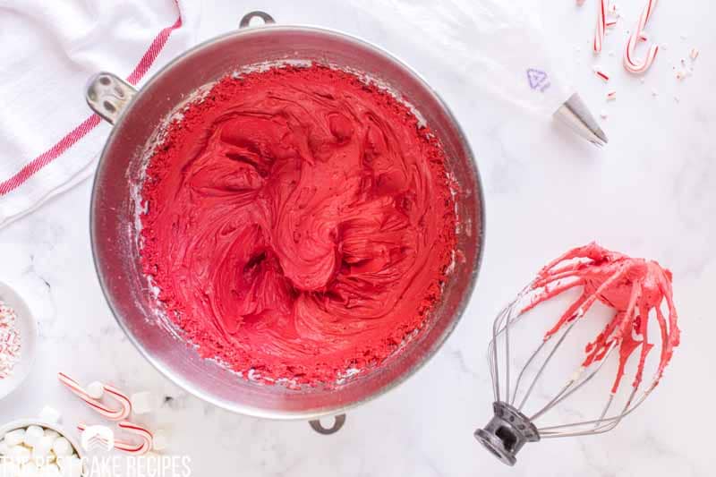 red frosting in a mixing bowl