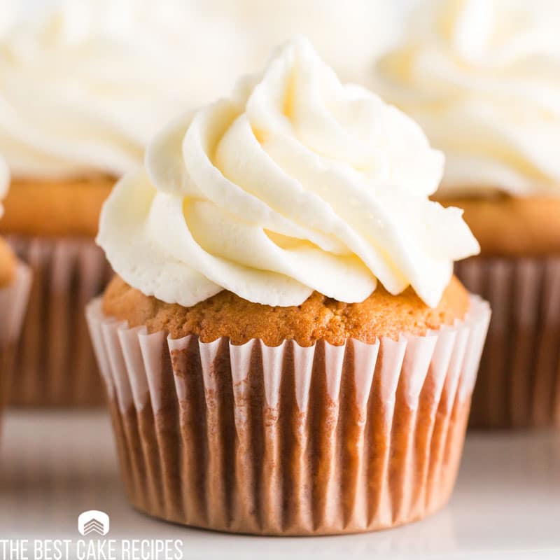 spiced cupcake with lemon buttercream on a table