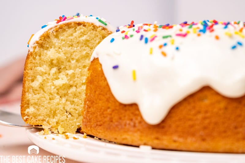 donut bundt cake with a piece on a spatula