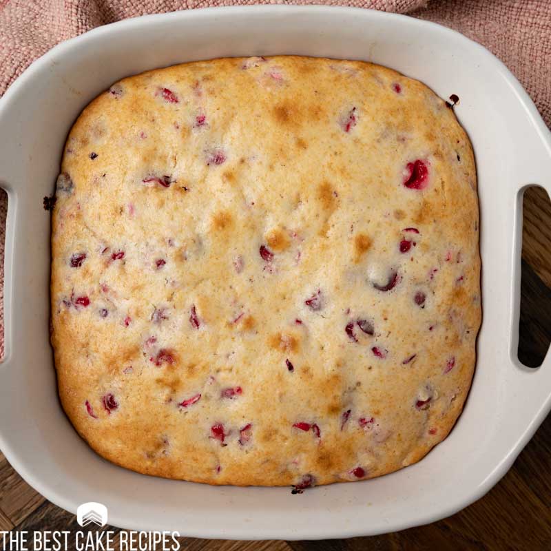 baked cranberry cake in an 8x8 pan