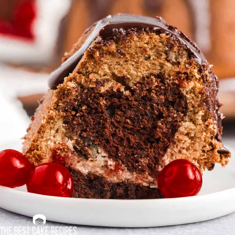 slice of cherry marble cake on a plate
