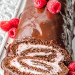 cake roll with chocolate ganache and raspberries