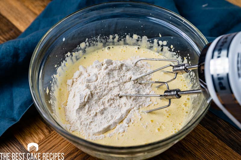 flour mixing into cake batter