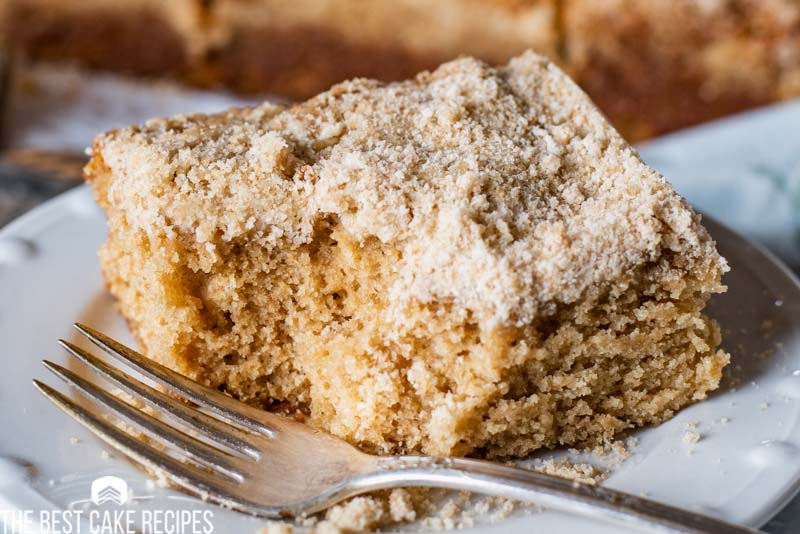 crumb snack cake on a plate with a fork