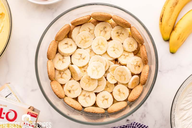 sliced bananas and vanilla wafers in a trifle dish