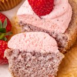 overhead view of a homemade strawberry cupcake cut in half