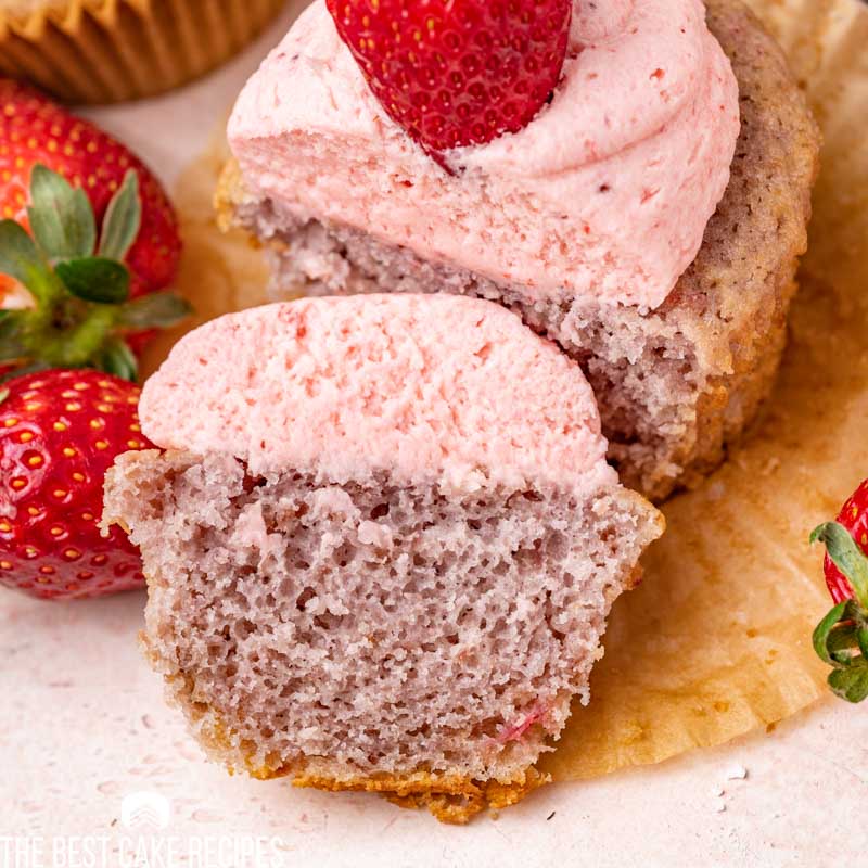 a strawberry cupcake sliced in half