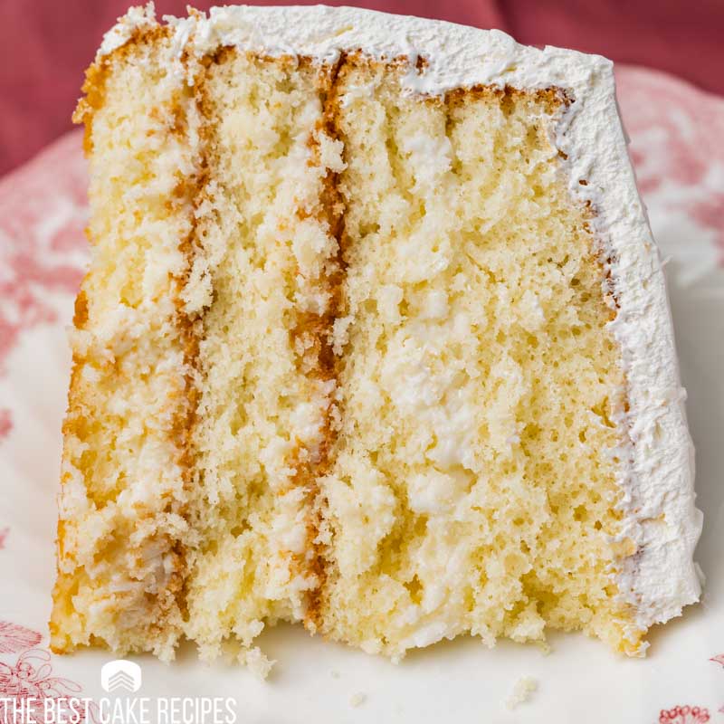 a piece of coconut cake on a plate