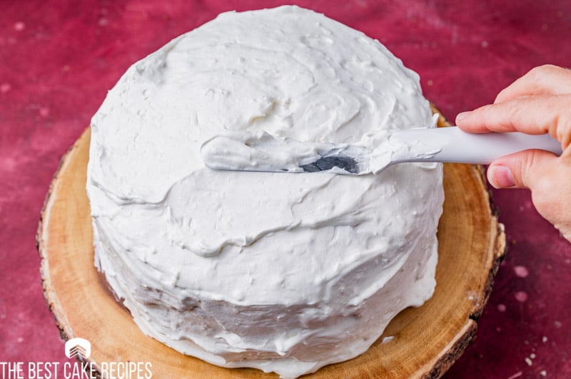 frosting a coconut cake