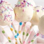 closeup of white chocolate covered cake pops