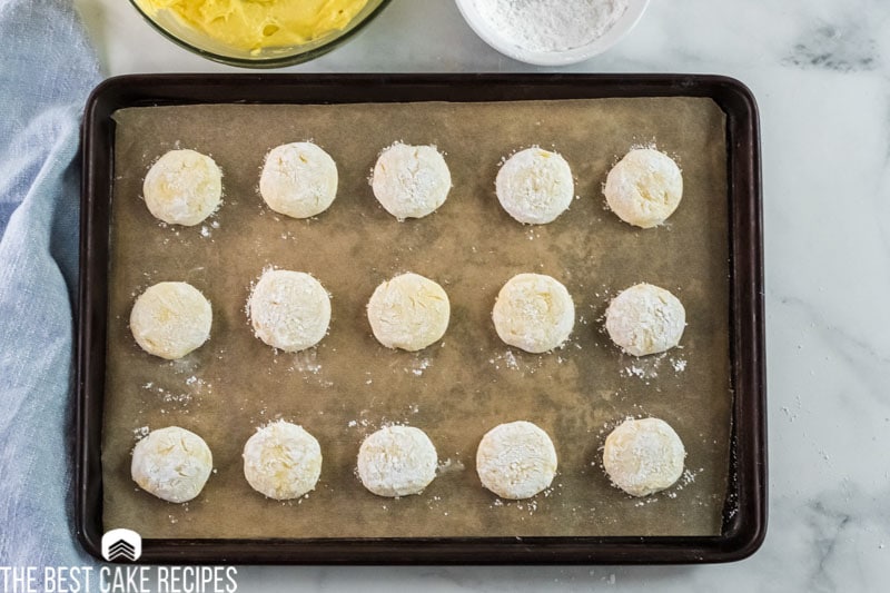 unbaked lemon cookies on a baking sheet