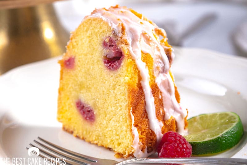 a slice of raspberry cake on a plate