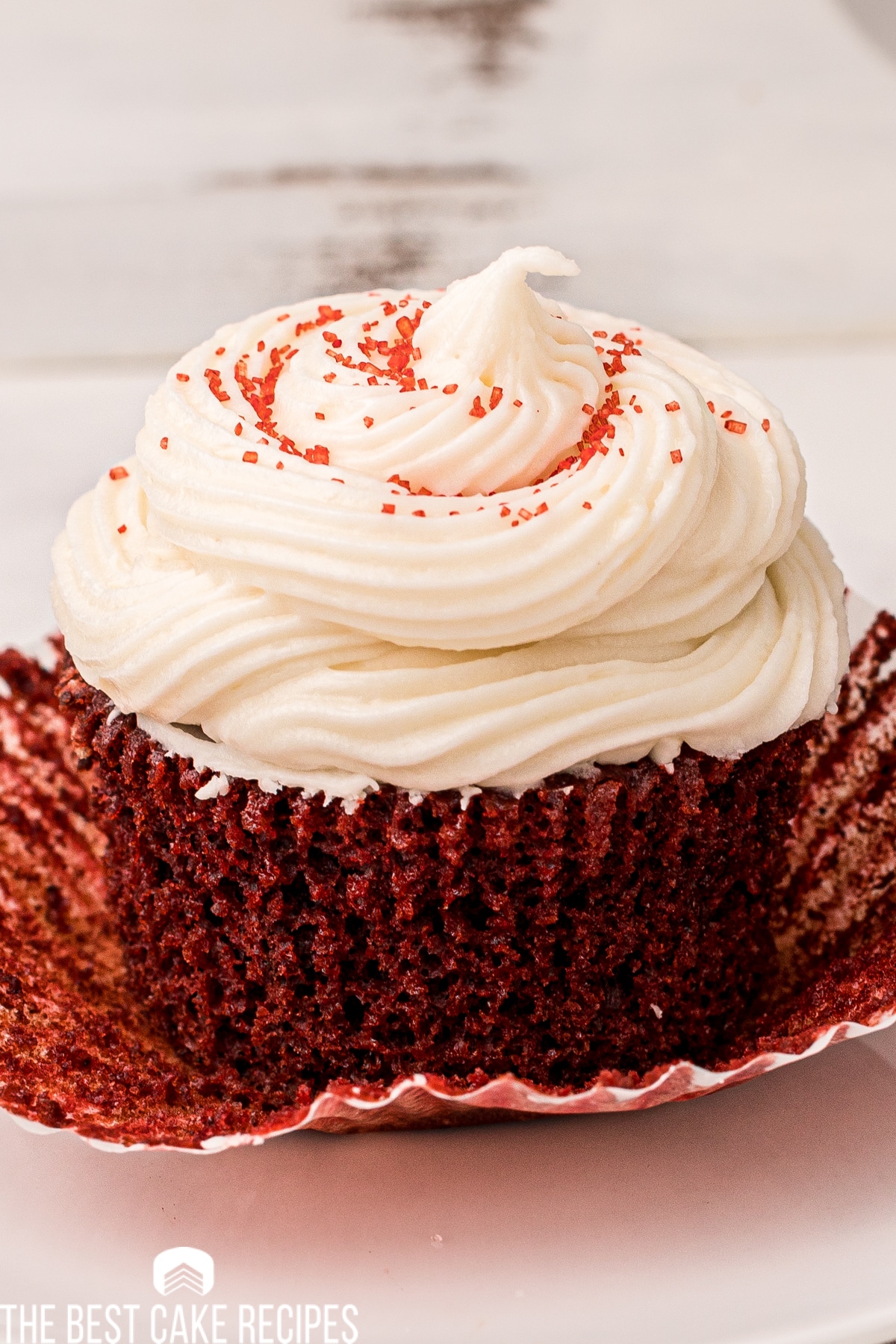 unwrapped cupcake with frosting