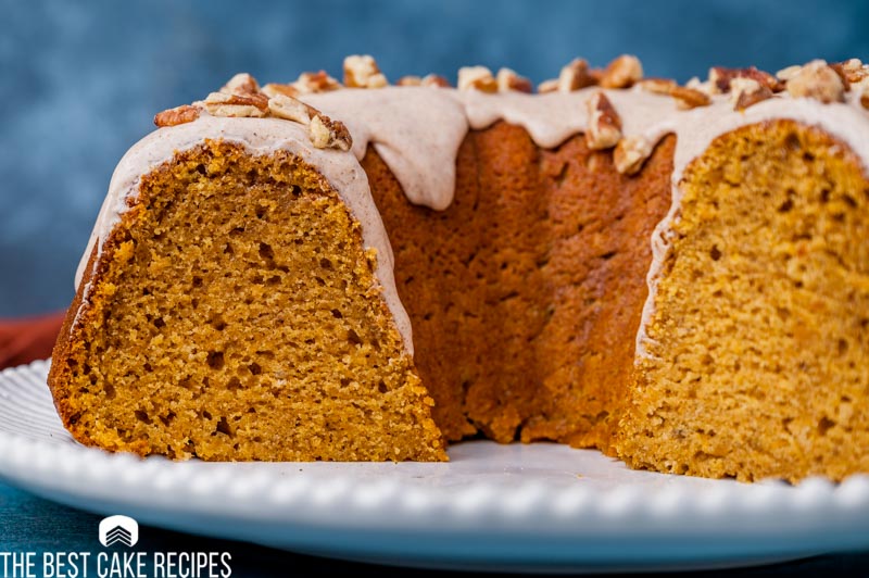 half of a bundt cake on a plate