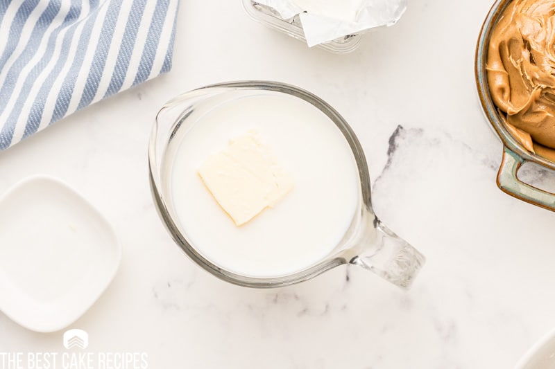butter and milk in a measuring cup