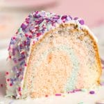 colorful bundt cake with sprinkles on a plate
