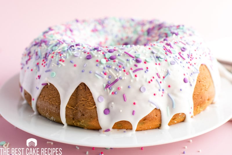 a frosted bundt cake on a plate