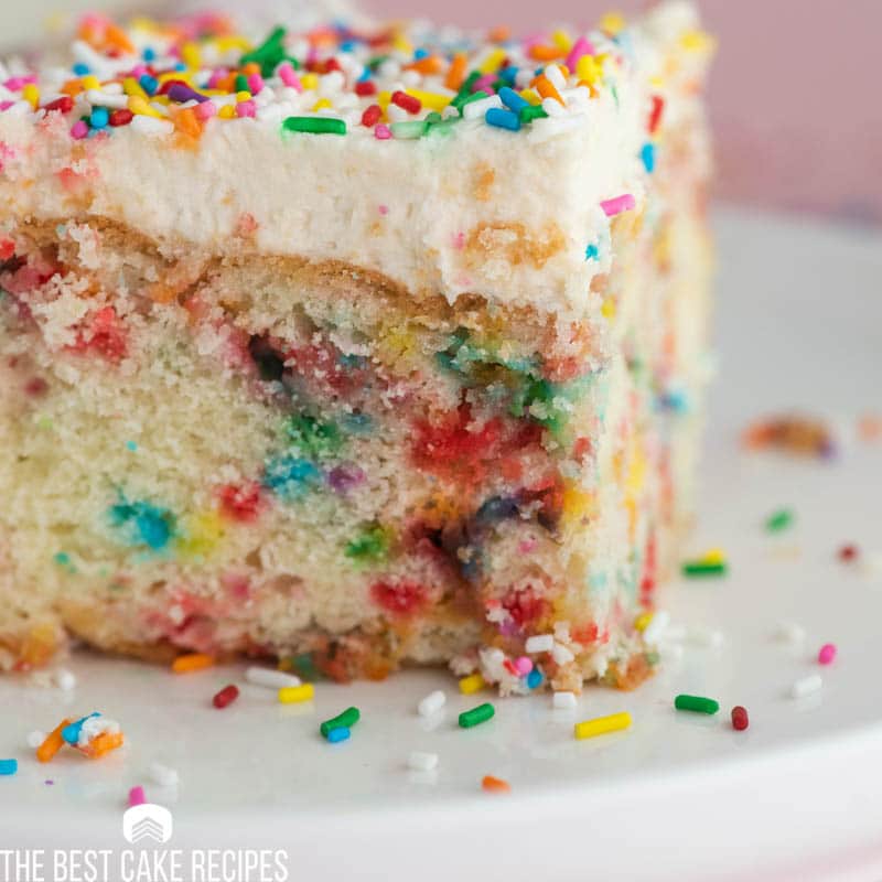 a closeup of a piece of funfetti birthday cake on a plate