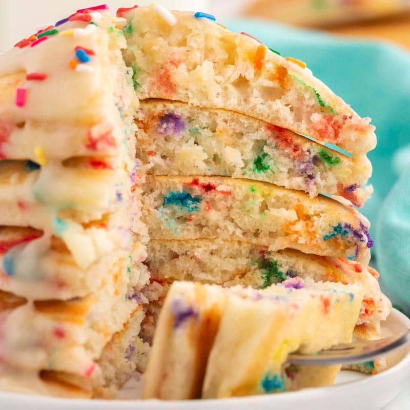 stack of funfetti pancakes with a bite out