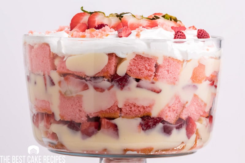 strawberry cheesecake trifle in a glass dish