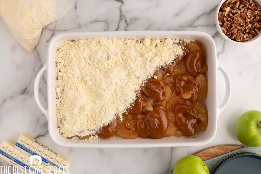 cake mix over caramel and apples