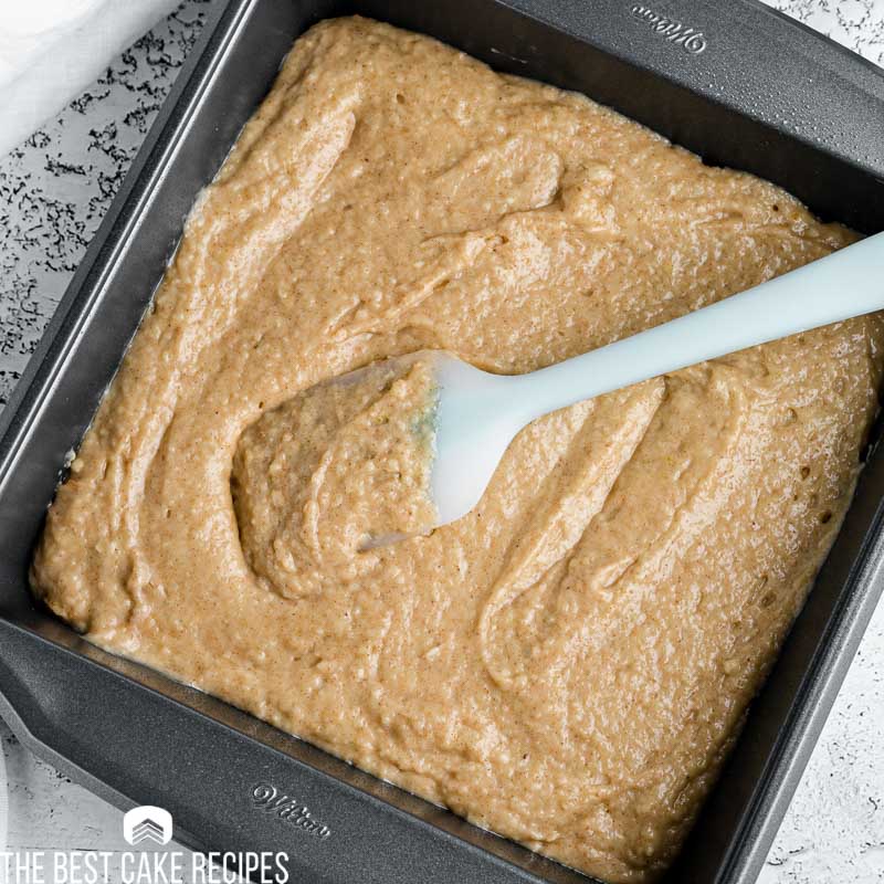 spatula spreading batter in a pan