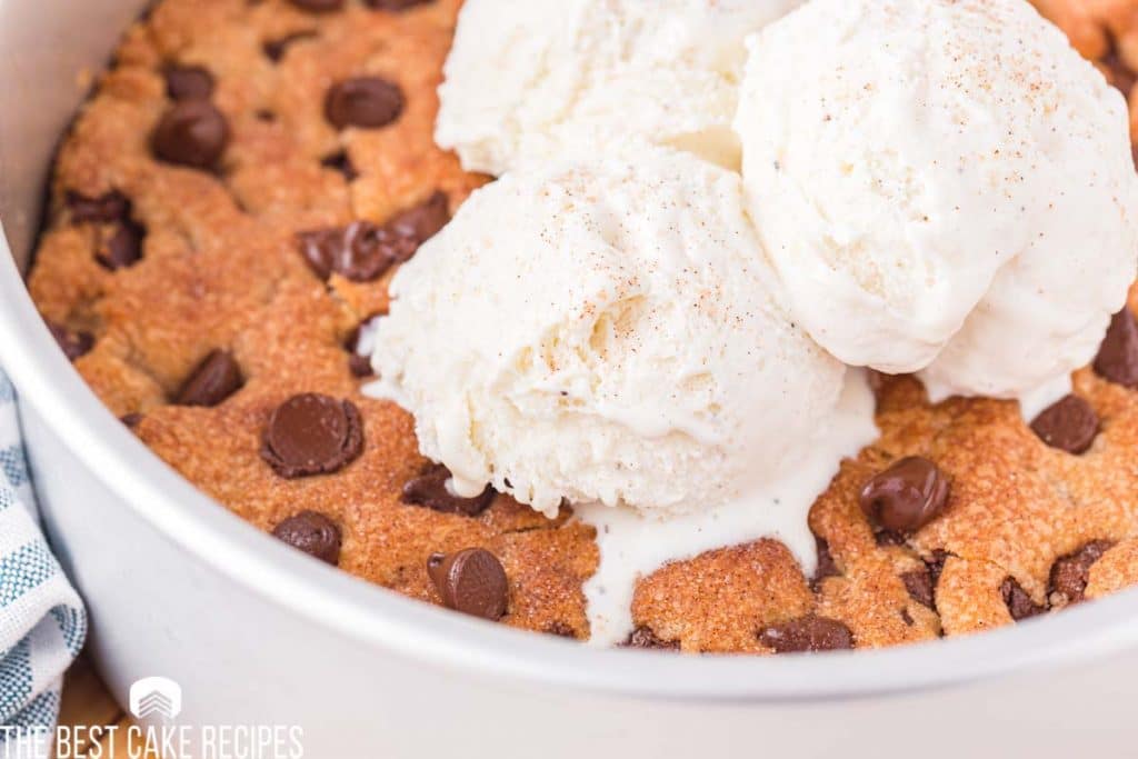 closeup of a chocolate chip cookie with ice cream