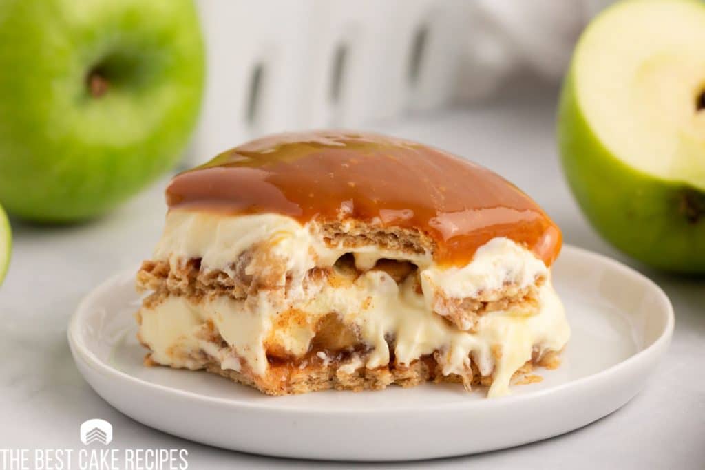 caramel apple eclair cake with a bite out