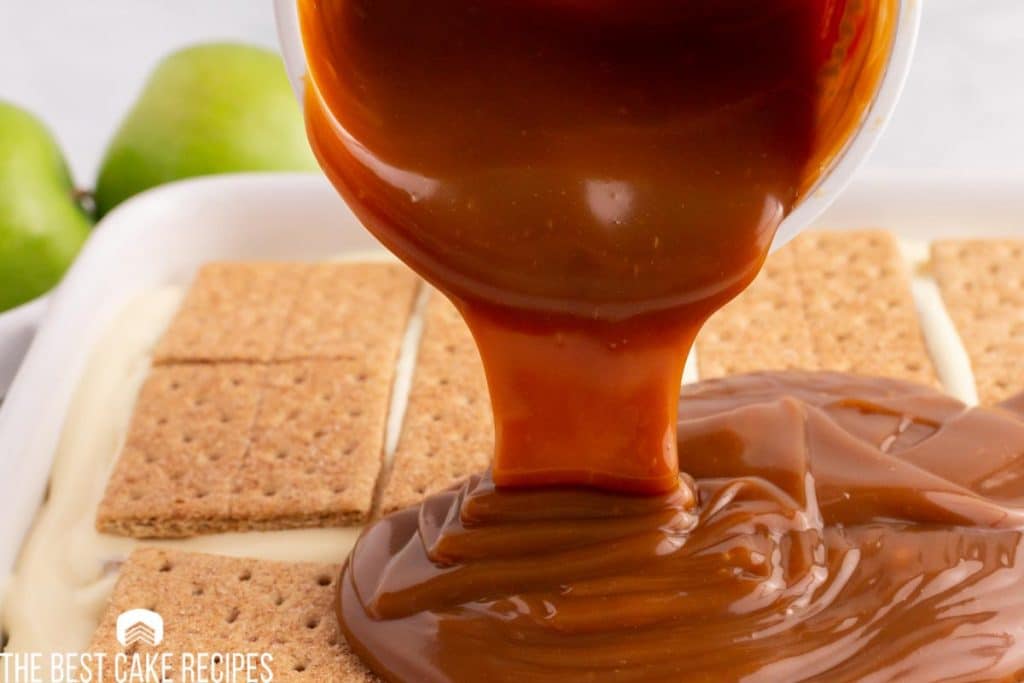 caramel pouring over graham crackers