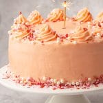 valentine's day layer cake with a sparkler on top