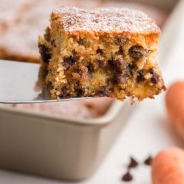 a slice of carrot cake on a spatula