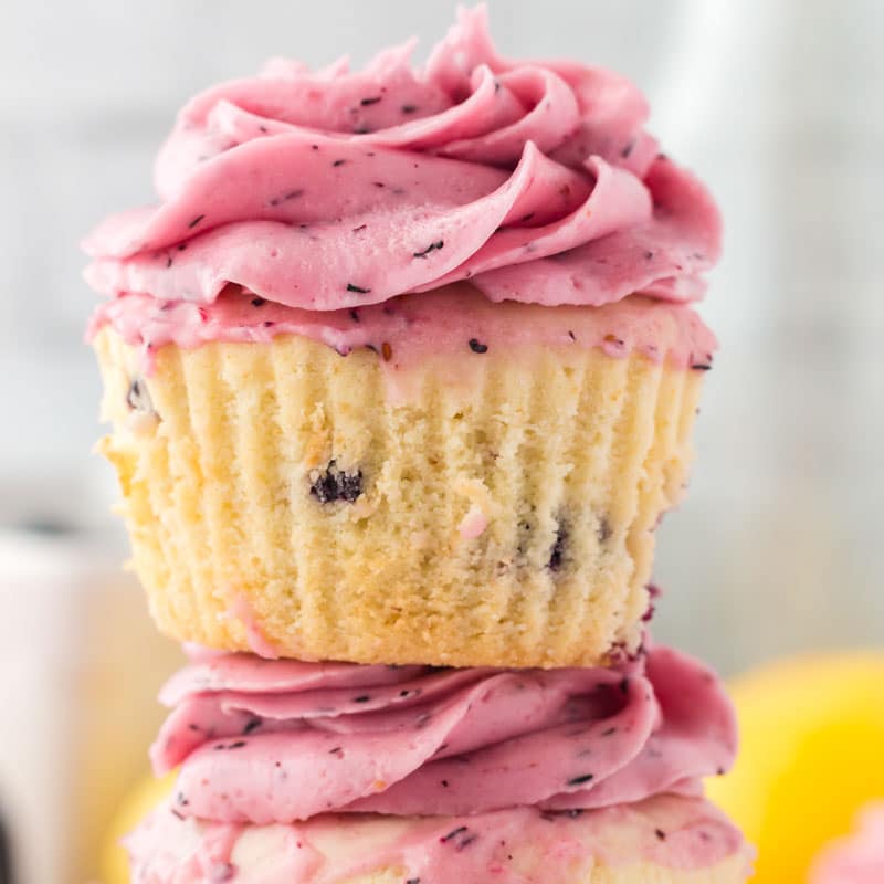 a lemon blueberry cupcake with blueberry frosting
