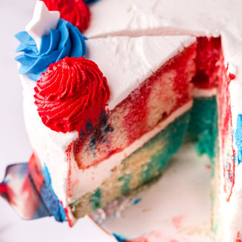 a piece of patriotic jello cake on a spatula