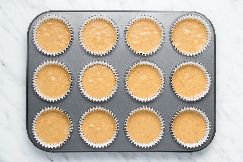 unbaked banana cupcakes in a pan