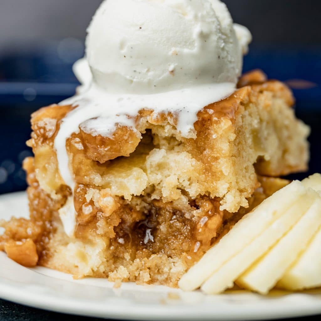 two slices of apple cake with ice cream on top