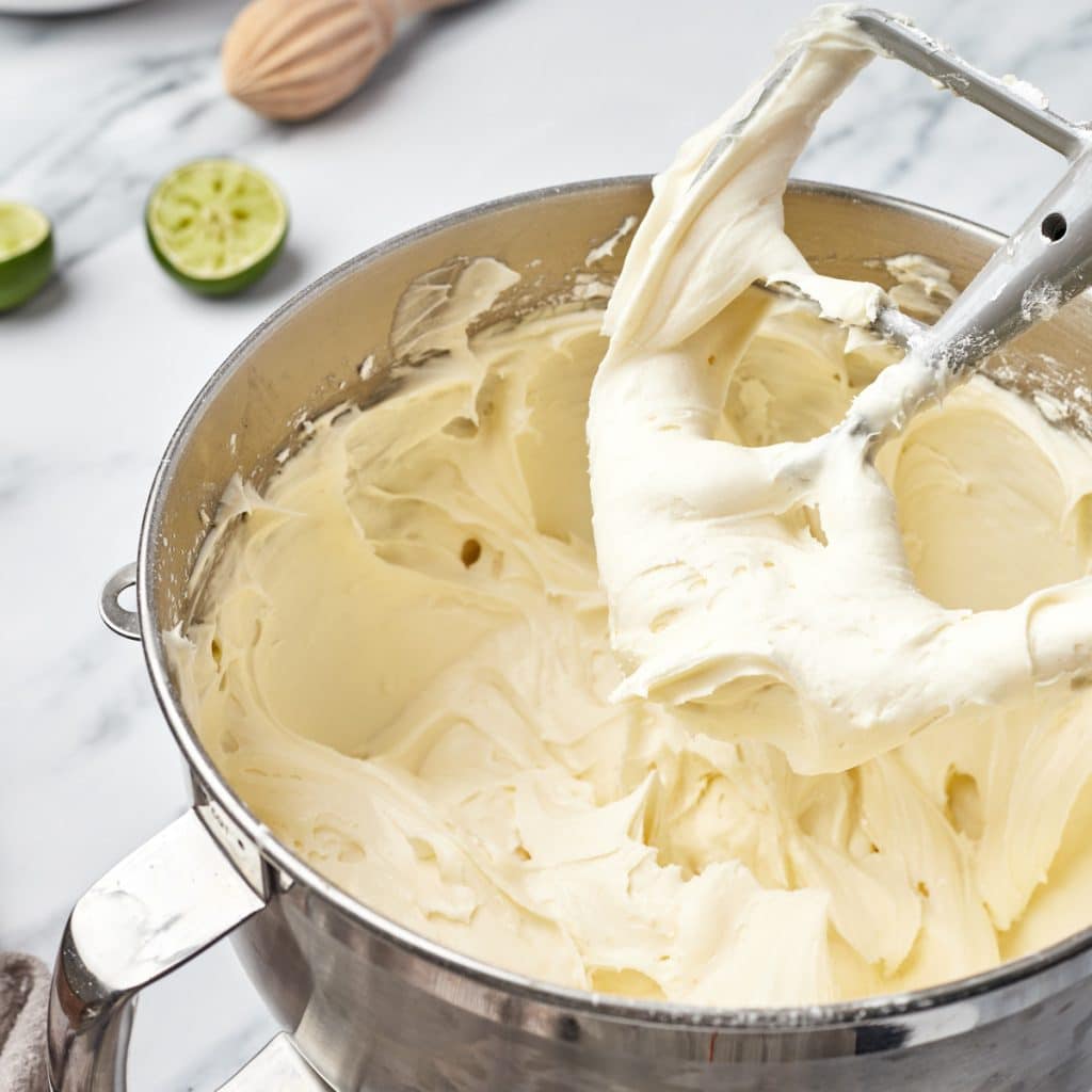 lime cream cheese frosting in a mixing bowl