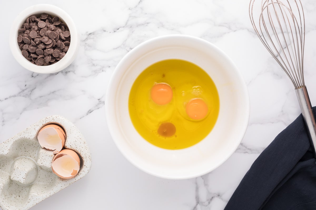 eggs, olive oil and vanilla in a mixing bowl