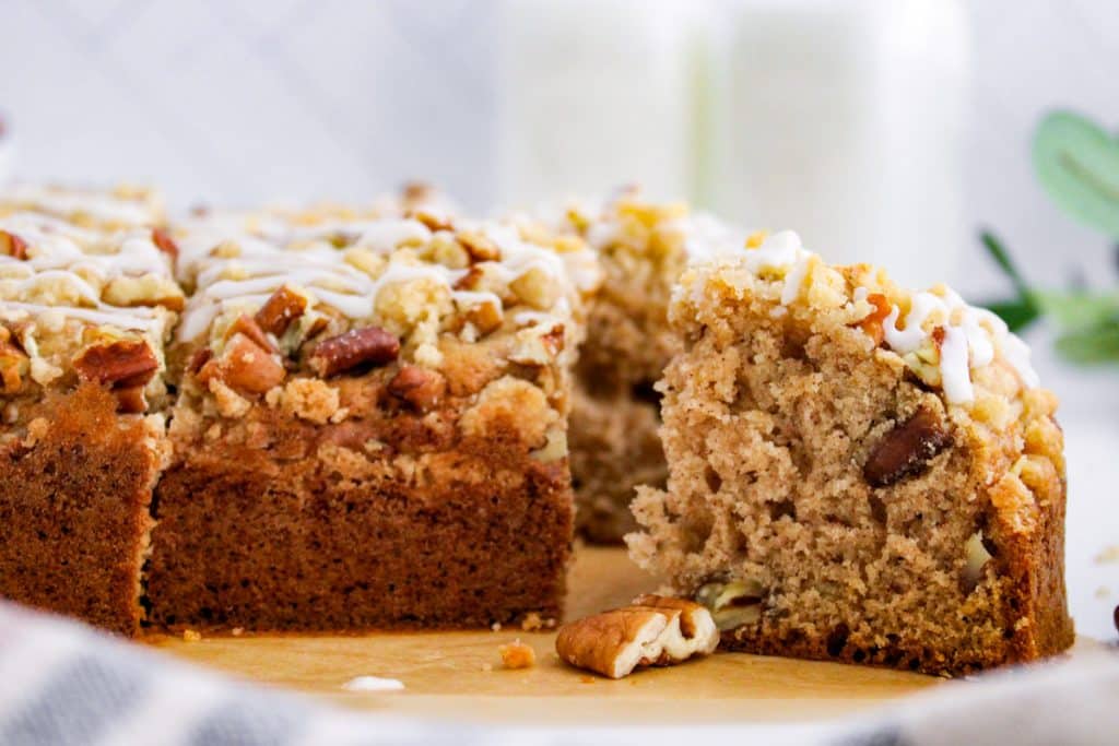 coffee cake with pecans sitting on a table