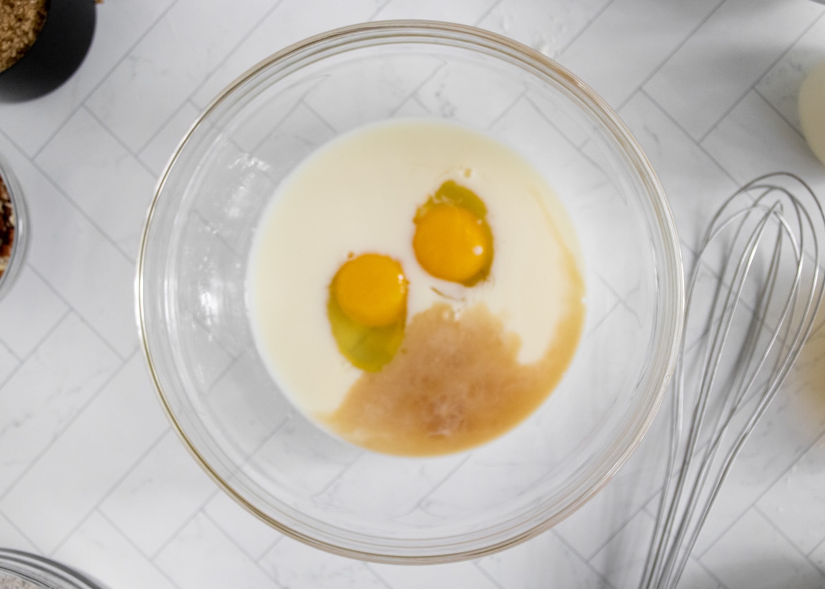 eggs, milk and vanilla in a mixing bowl