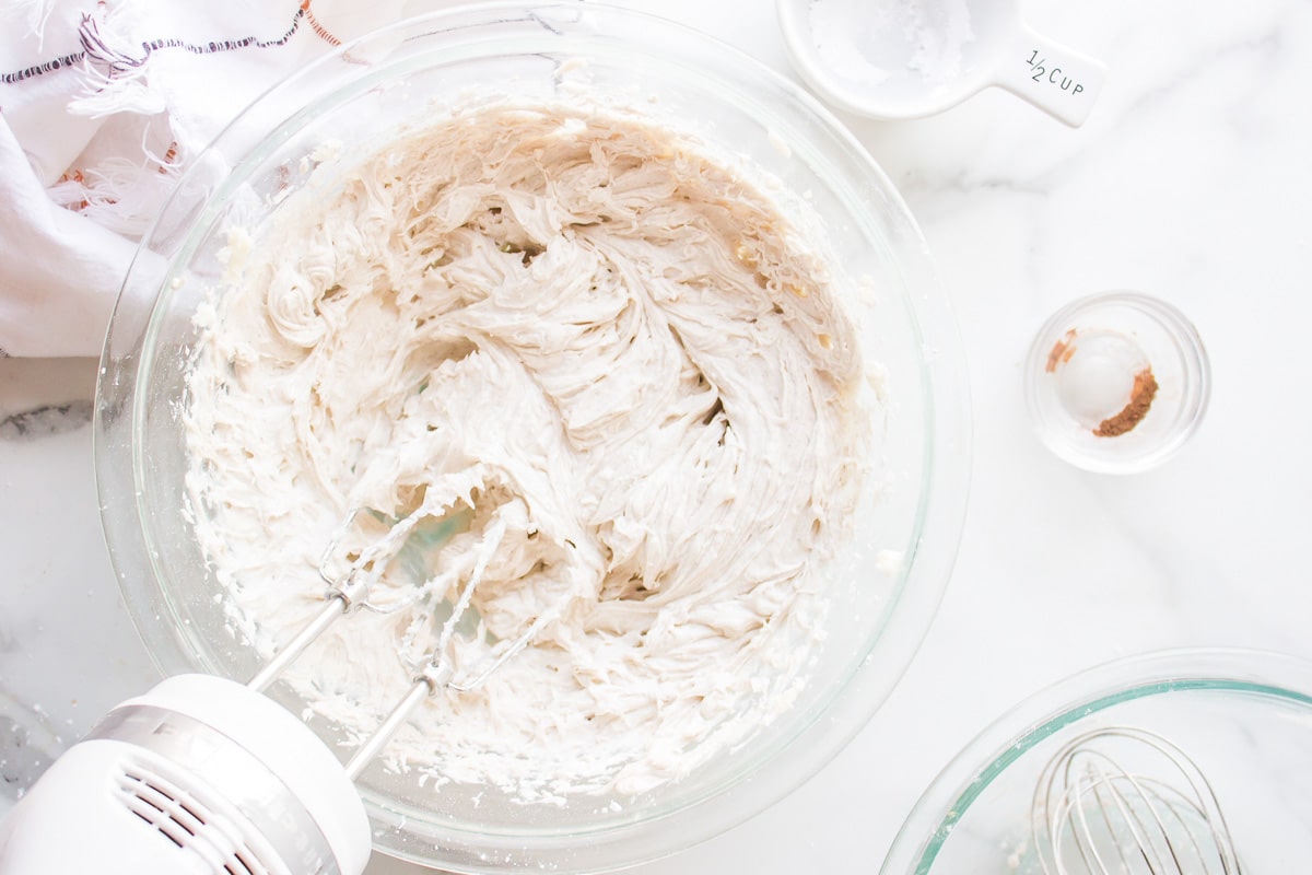 whipped buttercream in a mixing bowl