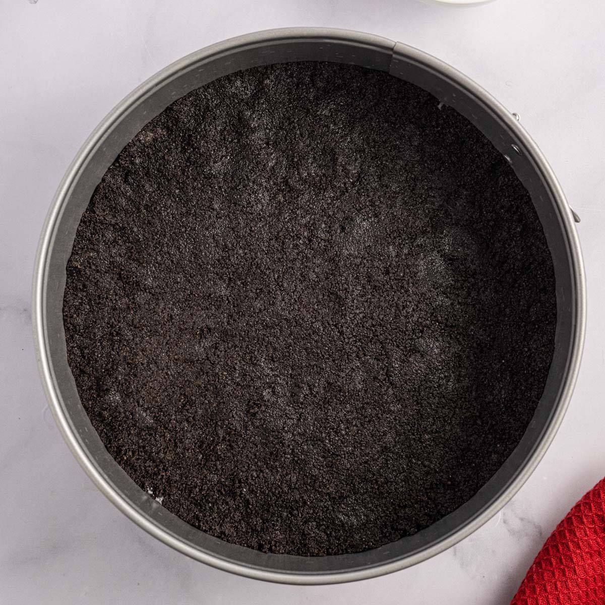 oreo crust pressed in a springform pan