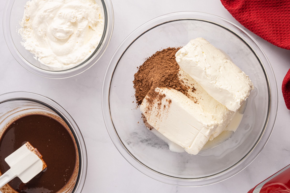 cream cheese and cocoa powder in a mixing bowl