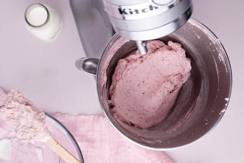 cake batter for strawberry vanilla cake in a stand mixer bowl